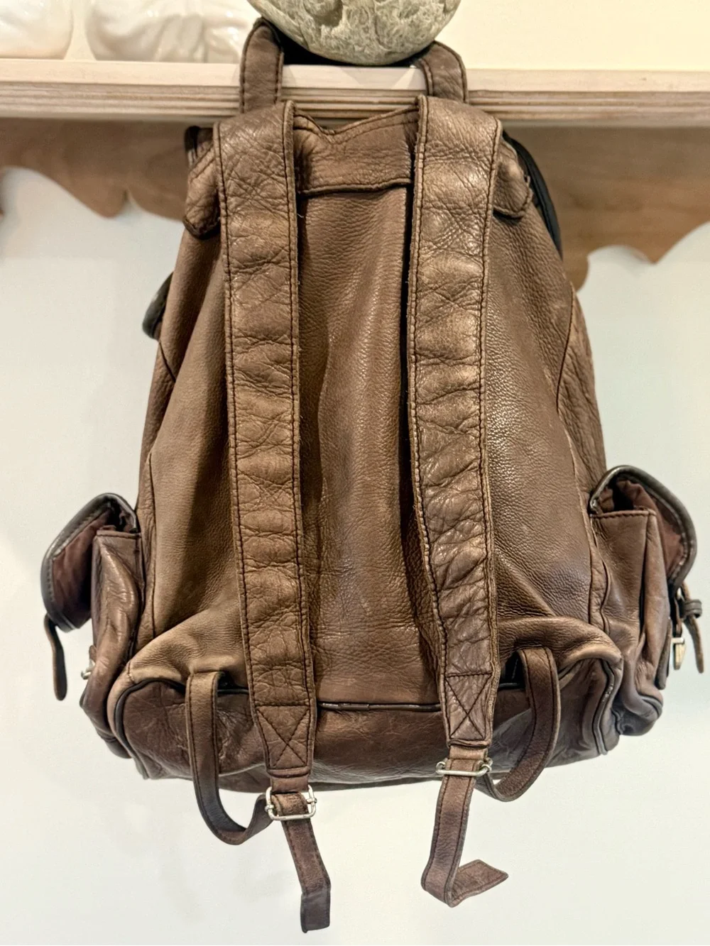 Men's Brown Leather Backpack with Front and Side Pockets